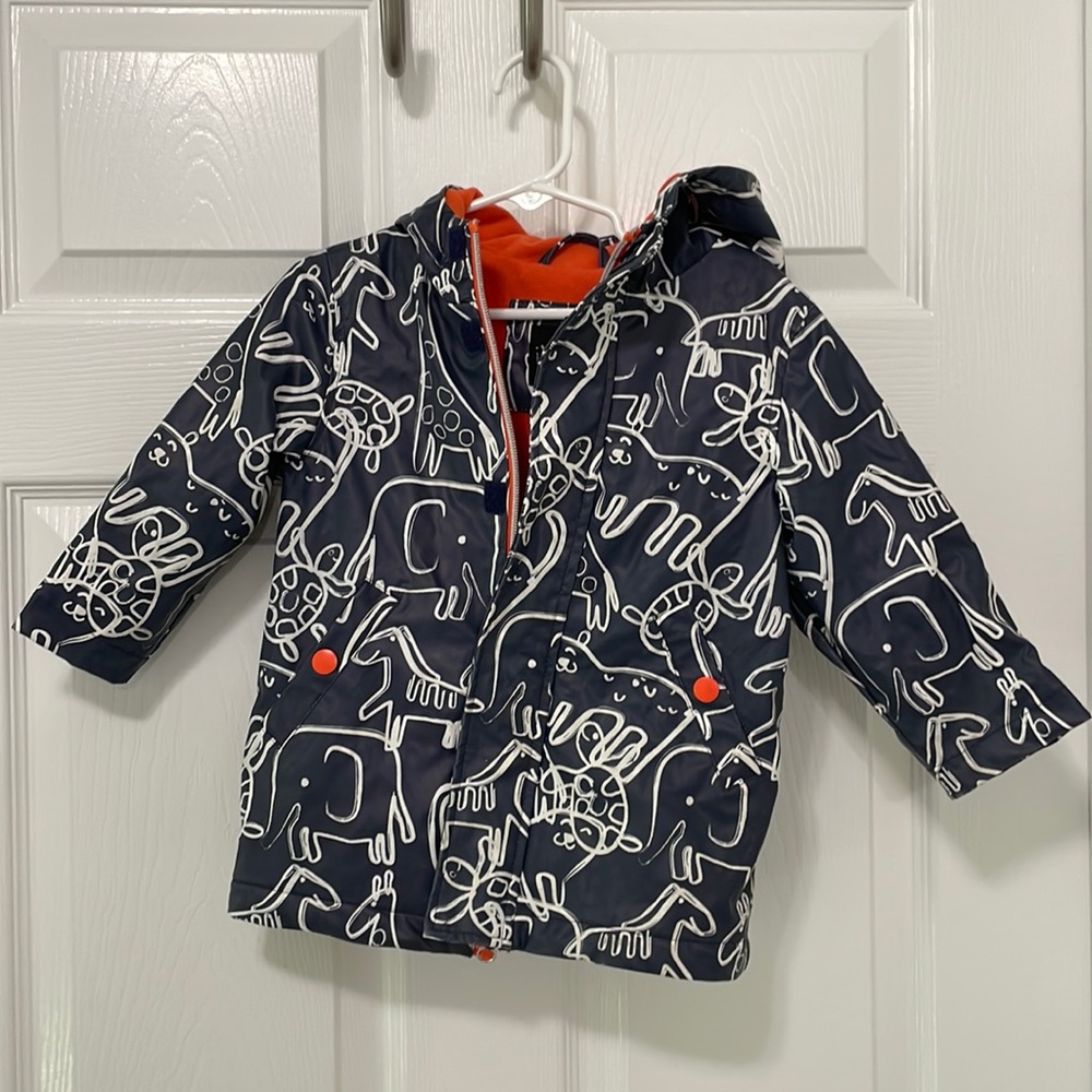 Gender neutral raincoat with animal print